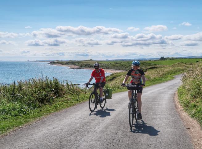 Biking along coastal road