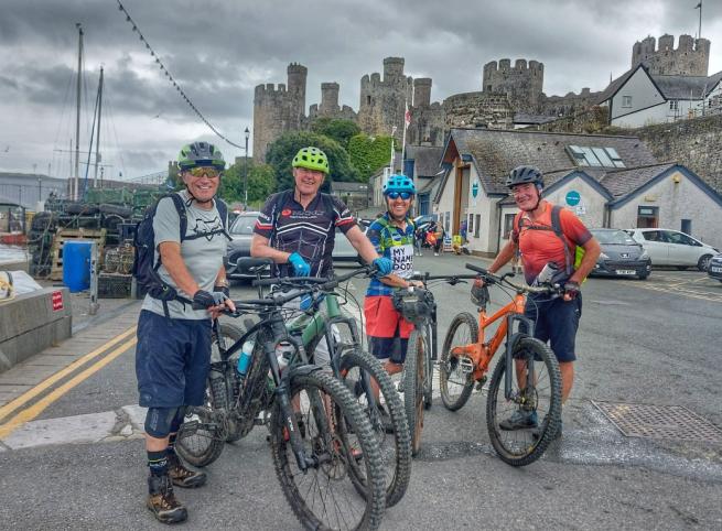 Mountain bikers at Conwy Castle