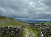 Climb up rocky track in Dales