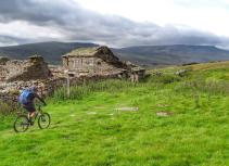 Mountain biker at abandoned building