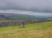 Mountain biker in cloudy landscape