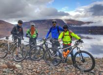 Mountain bikers loch view