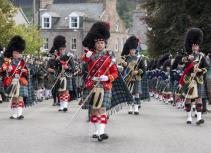 pipe band marching at highland games