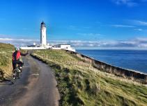 Biker near lighthouse