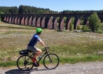 biker at viaduct