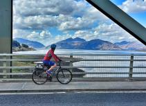 Biking on a bridge with scenic view