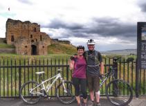 Biking couple at Tynemouth Priory