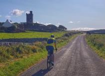 Cyclist on country road 