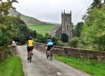 Cyclists crossing bridge