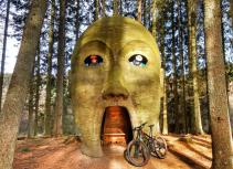 Forest sculpture mountain bikers