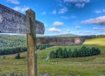 Hiking signs southern upland way landscape