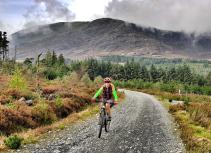 Mountain biking on a forest trail