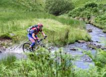 Mountain biking stream crossing
