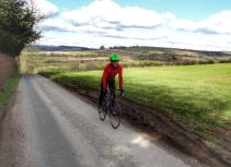 Cyclist on country road